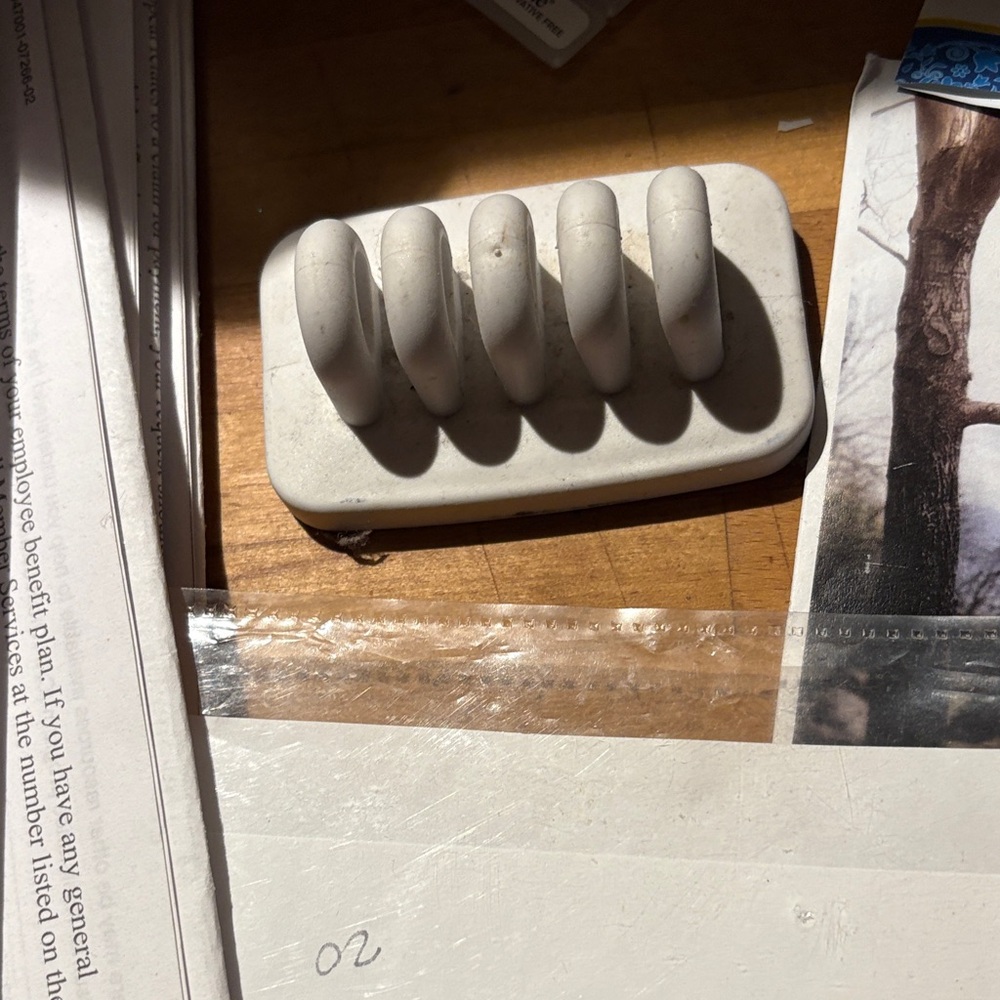White multi Cable Holder & organizer by Envisioned. Good condition.